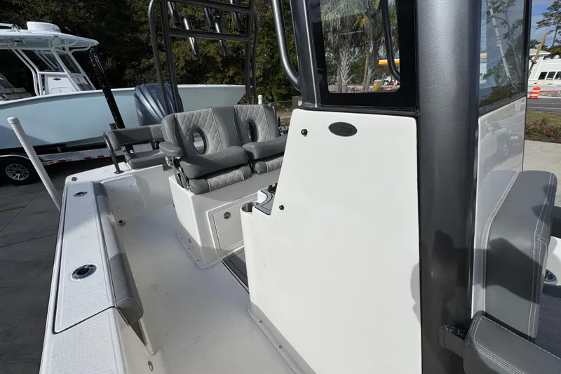 Slide: The Image of 2026 Sea Born FX261 Bay boat interior with seating and console. - 25
