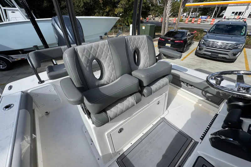 Slide: The Image of 2026 Sea Born FX261 Bay boat interior with luxurious seating and modern steering console. - 37