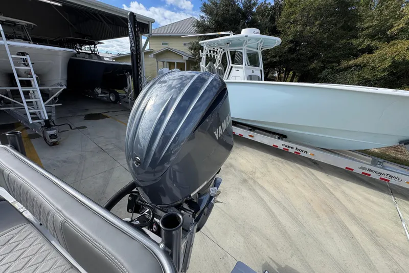 Slide: The Image of 2026 Sea Born FX261 Bay boat with Yamaha engine on trailer. - 42