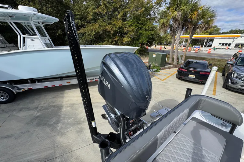 Slide: The Image of 2026 Sea Born FX261 Bay boat with Yamaha outboard motor in a parking lot. - 43