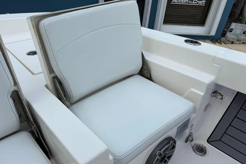 Slide: The Image of 2023 Pathfinder 2600 TRS boat seat with white upholstery and integrated speaker. - 14