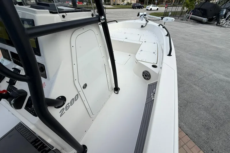 Slide: The Image of 2023 Pathfinder 2600 TRS boat interior with console and seating area. - 25