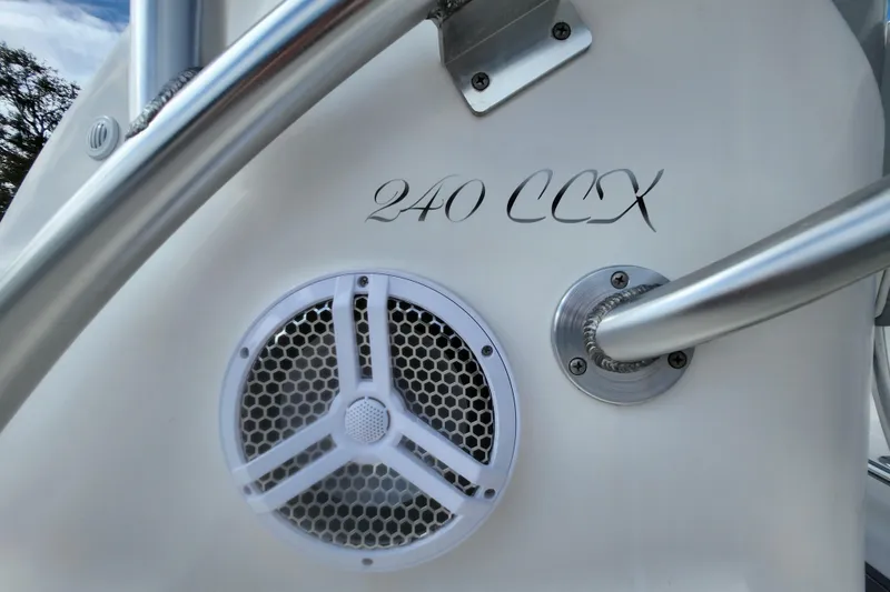 Slide: The Image of 2020 Glasstream 240 CCX boat detail with speaker and railing. - 11