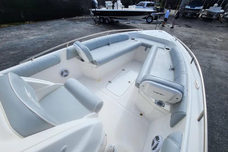 Slide: The Image of 2020 Glasstream 240 CCX boat interior with gray seating and spacious layout. - 15