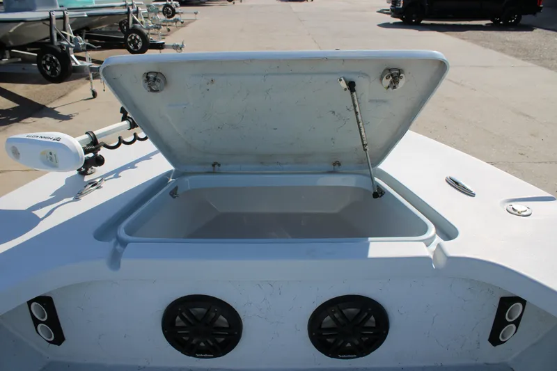 Slide: The Image of Yamaha 200 outboard motor on 2020 Blazer 2220 GTS boat, docked on concrete surface. - 12