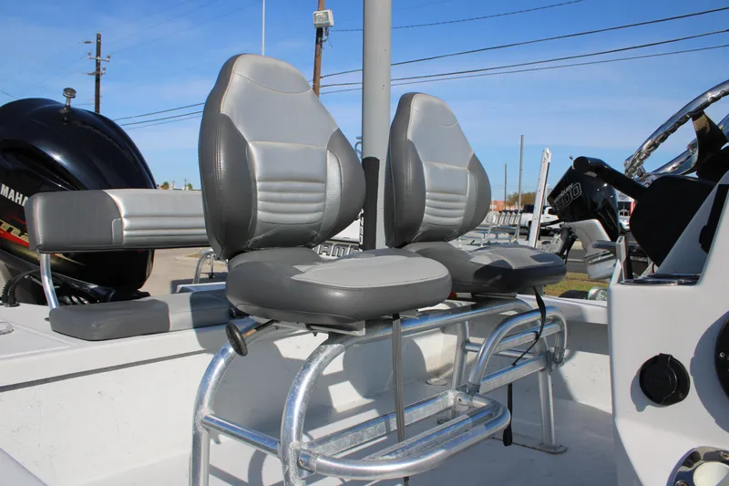 Slide: The Image of 2020 Blazer 2220 GTS boat on trailer at marine center, side view. - 2