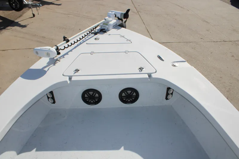 Slide: The Image of 2020 Blazer 2220 GTS boat with seating and console, displayed outdoors. - 3