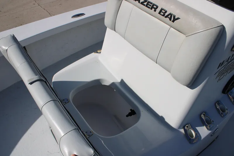 Slide: The Image of 2020 Blazer 2220 GTS boat deck with storage compartments and speakers. - 5