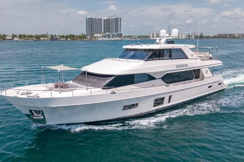 Slide: The Image of 2017 Ocean Alexander Motor Yacht cruising on blue waters near a city skyline. - 14