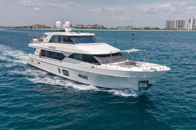 Slide: The Image of 2017 Ocean Alexander Motor Yacht cruising on blue ocean near city skyline. - 17