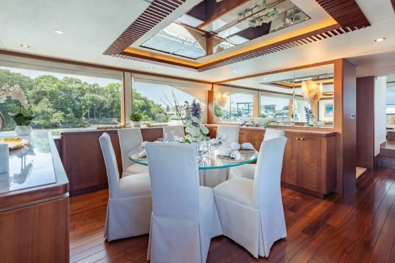Slide: The Image of Luxurious dining area on 2017 Ocean Alexander Motor Yacht with elegant decor and scenic views. - 2