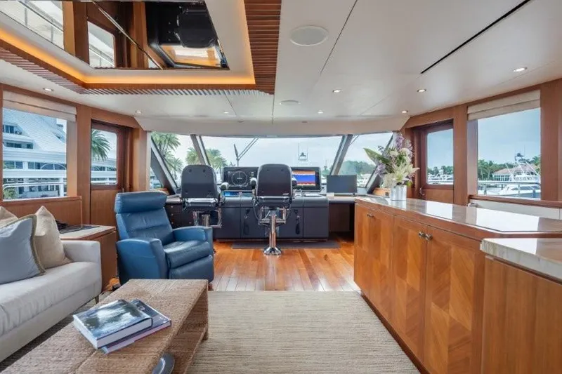 Slide: The Image of Luxurious 2017 Ocean Alexander motor yacht interior with modern helm and elegant wood finishes. - 4