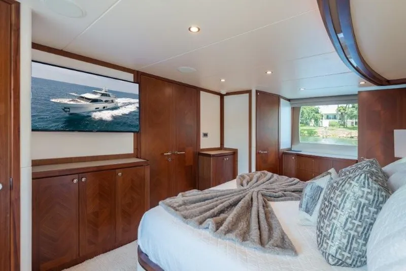 Slide: The Image of Luxurious bedroom interior of 2017 Ocean Alexander Motor Yacht with elegant wood finishes. - 40
