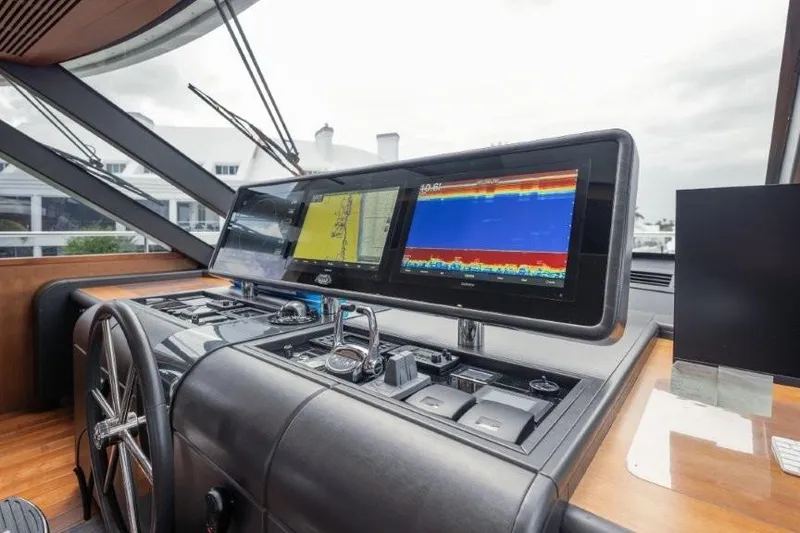 Slide: The Image of 2017 Ocean Alexander Motor Yacht helm with advanced navigation displays and controls. - 43