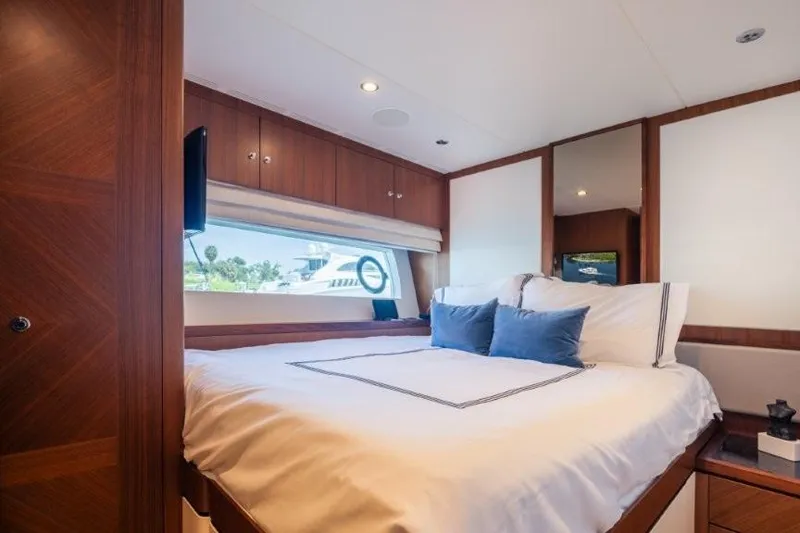 Slide: The Image of Luxurious bedroom interior of 2017 Ocean Alexander Motor Yacht with elegant wood finishes. - 53