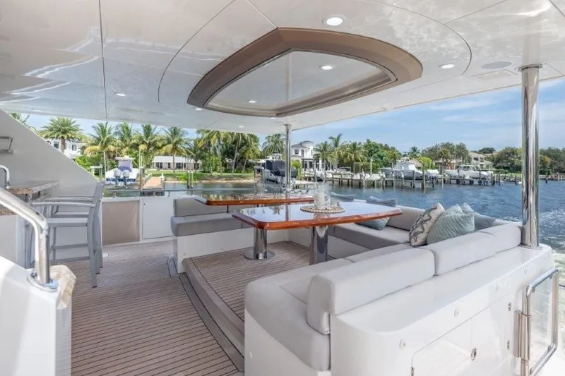 Slide: The Image of Luxurious 2017 Ocean Alexander motor yacht deck with elegant seating and waterfront view. - 67