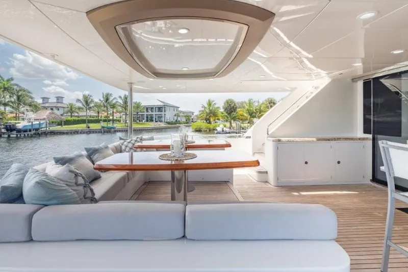 Slide: The Image of Luxurious 2017 Ocean Alexander motor yacht deck with elegant seating and waterfront view. - 69
