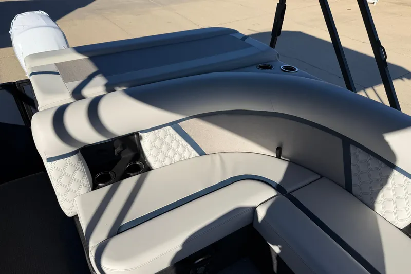 Slide: The Image of Luxurious seating on 2026 Crest Conquest 230 L pontoon boat, featuring elegant design and comfort. - 16