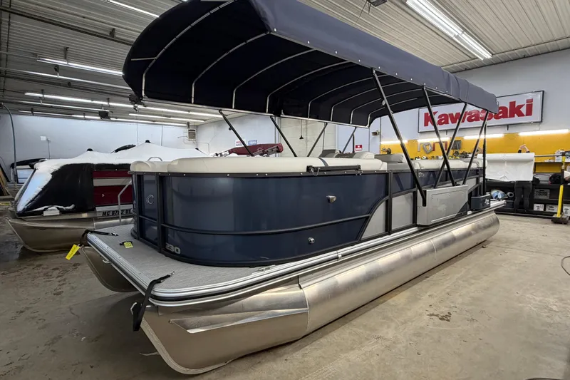 Slide: The Image of 2026 Crest Conquest 230 L pontoon boat interior with luxurious seating and modern design. - 22