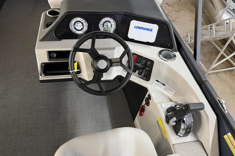 Slide: The Image of 2026 Crest Conquest 230 L boat interior with plush seating and modern design. - 28