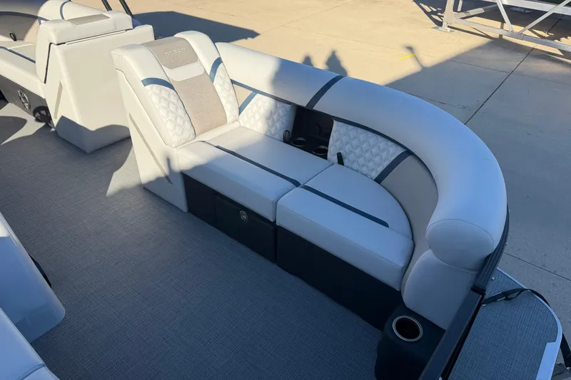 Slide: The Image of 2026 Crest Conquest 230 L boat interior with luxurious seating and modern design. - 7