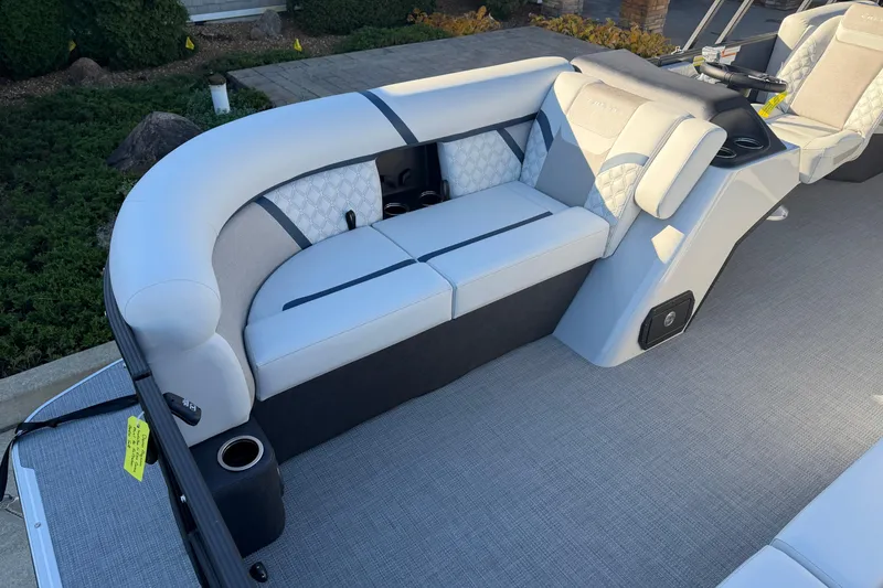 Slide: The Image of Interior of 2026 Crest Conquest 230 L boat with modern helm and seating. - 8