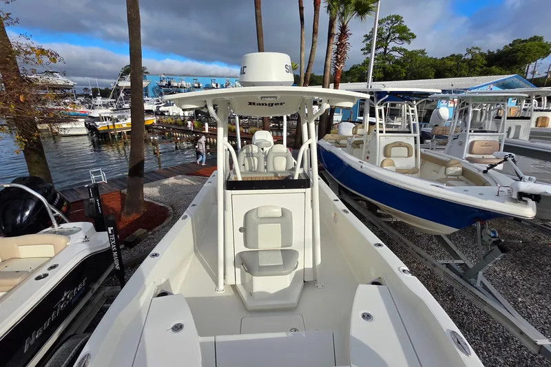 Slide: The Image of 2019 Ranger 2510 Bay Ranger boat storage compartments open, showcasing spacious interior. - 10