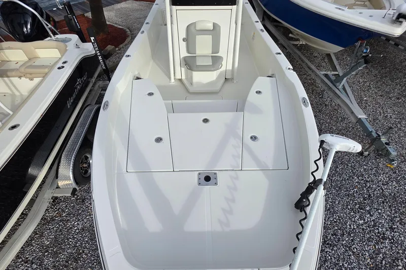 Slide: The Image of 2019 Ranger 2510 Bay Ranger interior storage compartment with wooden flooring. - 9