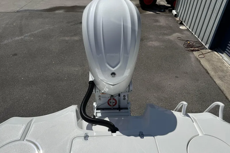 Slide: The Image of 2026 Blazer 2550 GTS boat engine, top view, on a concrete surface. - 15
