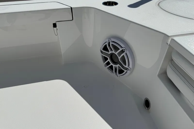 Slide: The Image of 2026 Blazer 2550 GTS boat interior with speaker and storage compartment. - 18