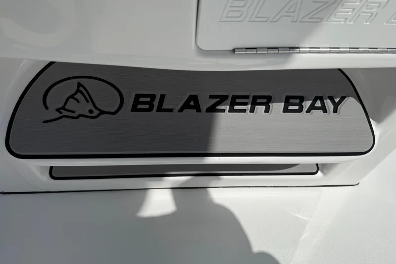 Slide: The Image of 2026 Blazer 2550 GTS boat logo on a sleek white surface. - 24