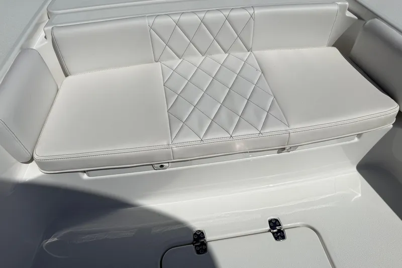 Slide: The Image of 2026 Blazer 2550 GTS boat with white cushioned seating and diamond stitching. - 30