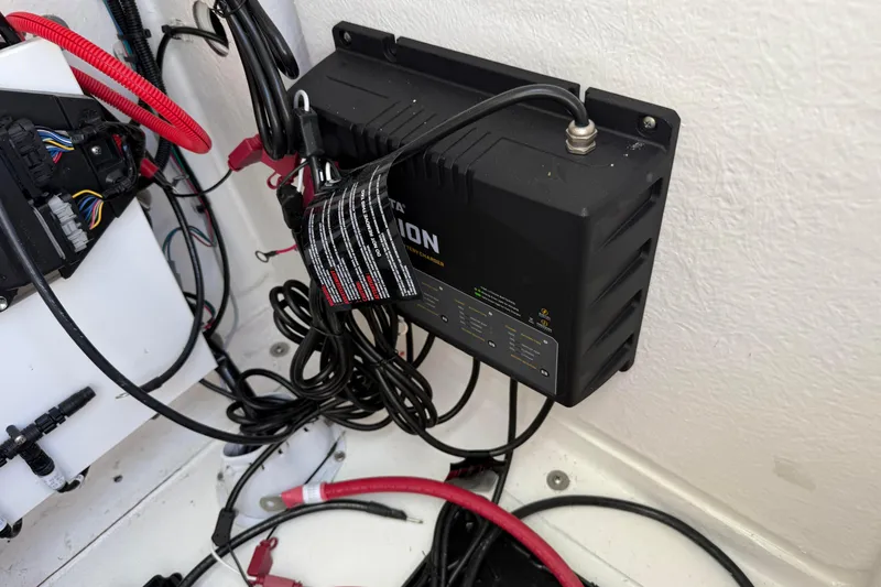 Slide: The Image of Electrical wiring and components inside a 2026 Blazer 2550 GTS boat. - 38