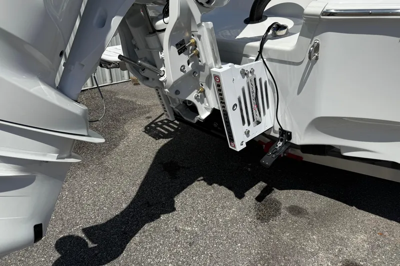 Slide: The Image of 2026 Blazer 2550 GTS boat engine mount detail with hydraulic components. - 7