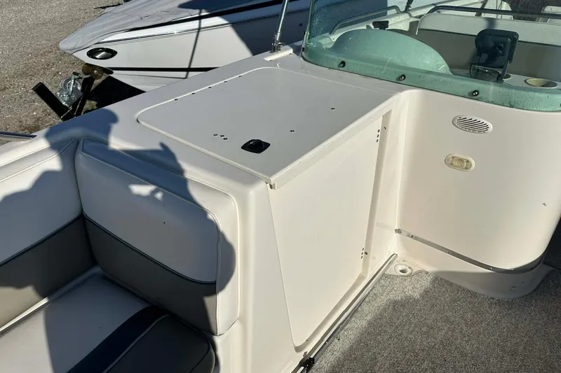 Slide: The Image of 1998 Bayliner 2659 Rendezvous boat interior with seating and control panel. - 3