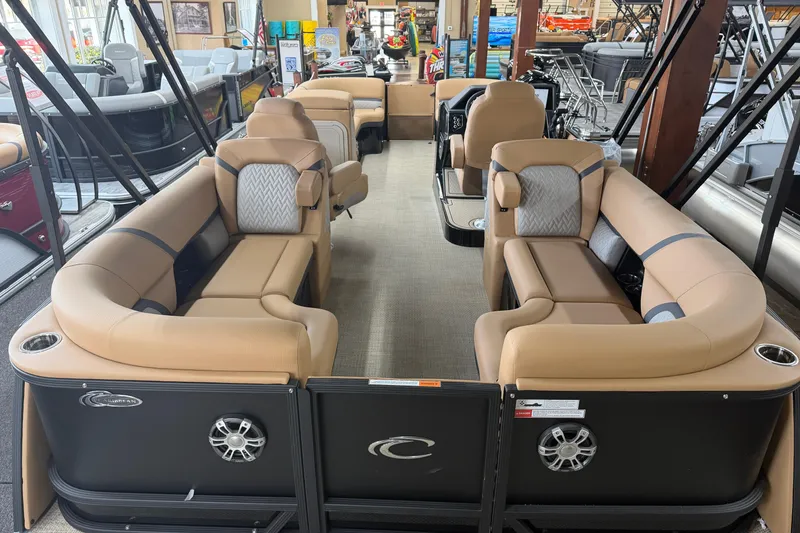 Slide: The Image of 2026 Crest Caribbean 230 SLC pontoon boat interior with luxurious seating and modern design. - 8