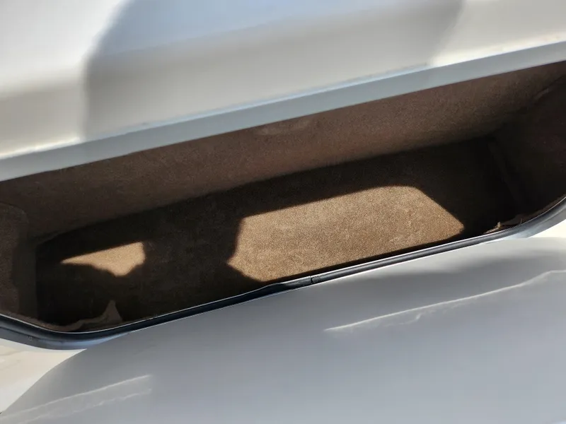 Slide: The Image of Storage compartment of a 2008 Glastron GT 249 boat. - 17