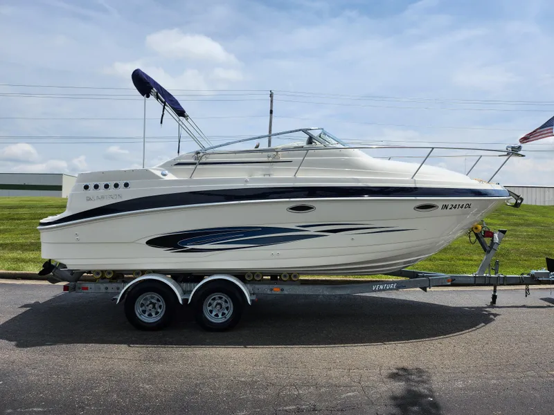 Slide: The Image of 2008 Glastron GT 249 boat on a trailer, side view. - 4
