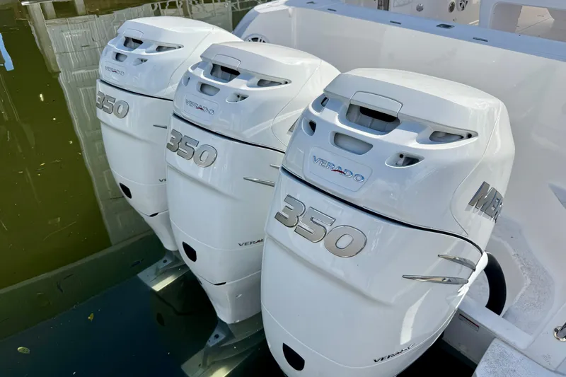 Slide: The Image of Triple Mercury Verado 350 engines on a 2022 Intrepid 409 Valor boat. - 23