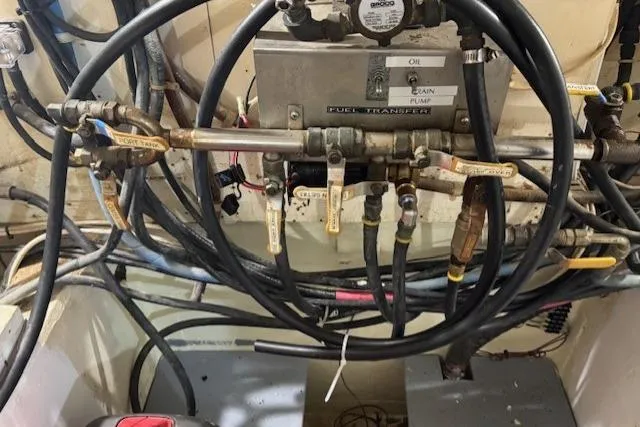 Slide: The Image of Engine room of 1985 Symbol 58 Cockpit Motor Yacht with fuel transfer system. - 31