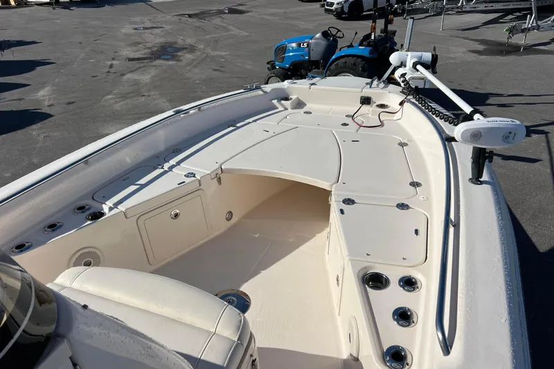 Slide: The Image of 2018 Grady-White 251 Coastal Explorer boat interior with fishing rod holders and storage compartments. - 4