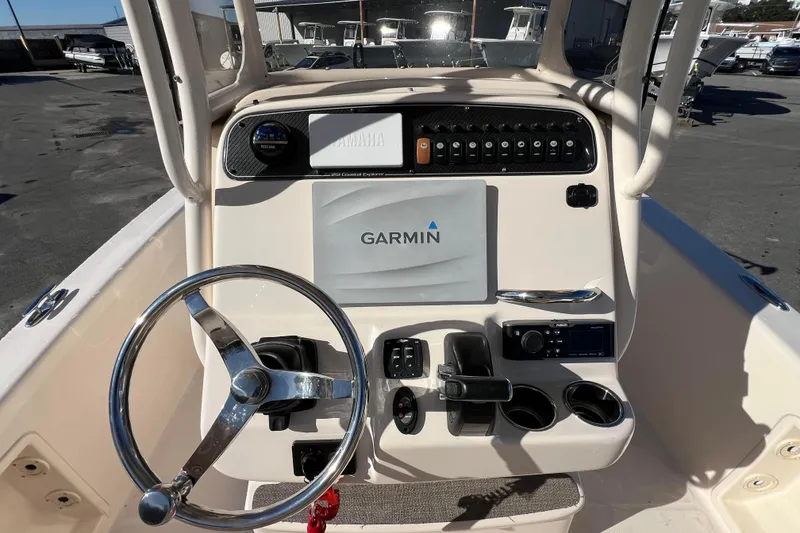 Slide: The Image of 2018 Grady-White 251 Coastal Explorer boat dashboard with Garmin navigation system. - 7