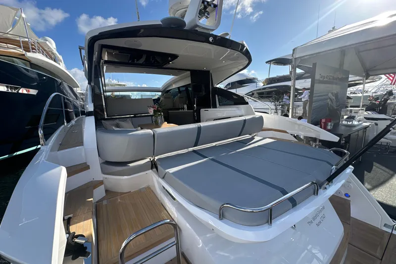 Slide: The Image of Luxurious interior of 2026 Fairline Targa 47 GT yacht with elegant seating and table. - 15