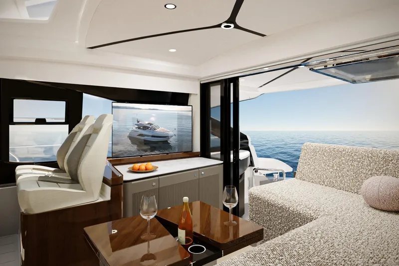 Slide: The Image of Luxurious interior of 2026 Fairline Targa 47 GT yacht with ocean view. - 2