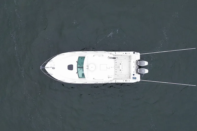 Slide: The Image of Aerial view of 2016 Boston Whaler 315 Conquest boat on water. - 10