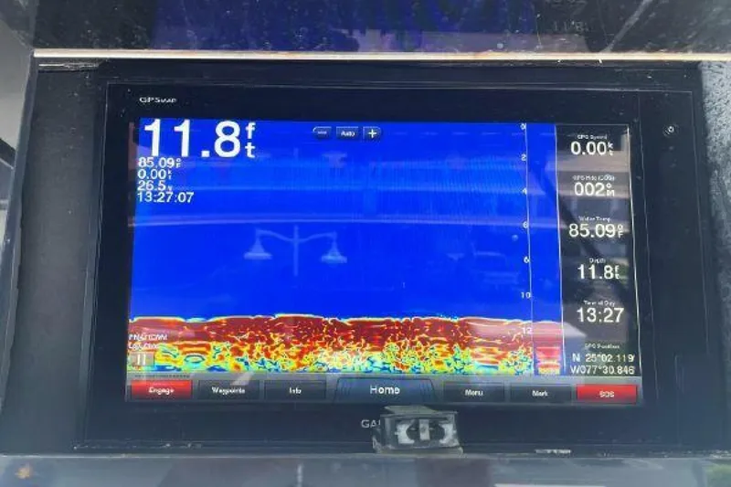 Slide: The Image of Fishfinder display on a 1981 Bertram Convertible boat showing depth and underwater details. - 14