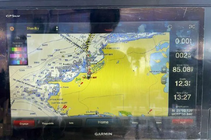 Slide: The Image of Garmin GPS display on a 1981 Bertram Convertible boat showing navigation map. - 18