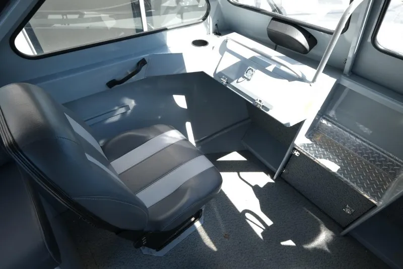 Slide: The Image of Interior of a 2019 Hewescraft 200 ProV boat, featuring a sleek, modern design. - 15