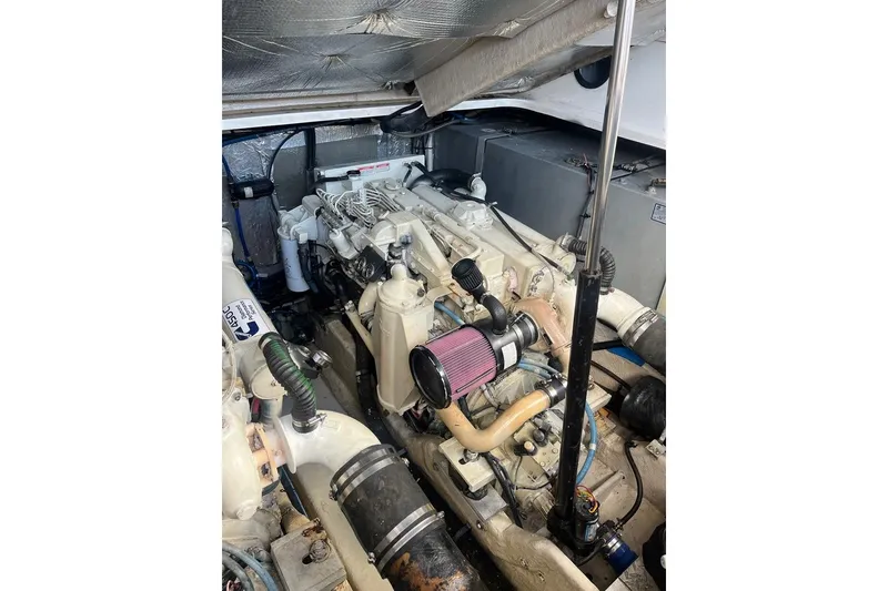 Slide: The Image of Engine room of 2003 Sea Ray 410 Express Cruiser. - 13