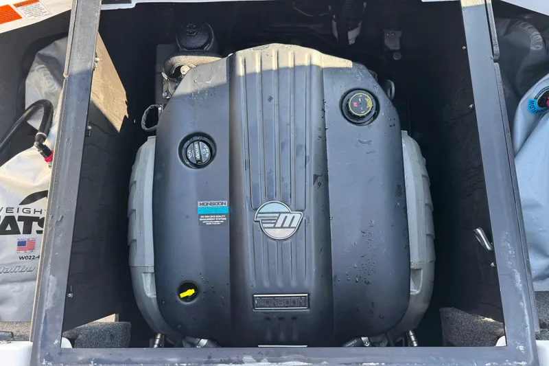 Slide: The Image of 2023 Axis T220 engine compartment showcasing Monsoon engine components. - 23